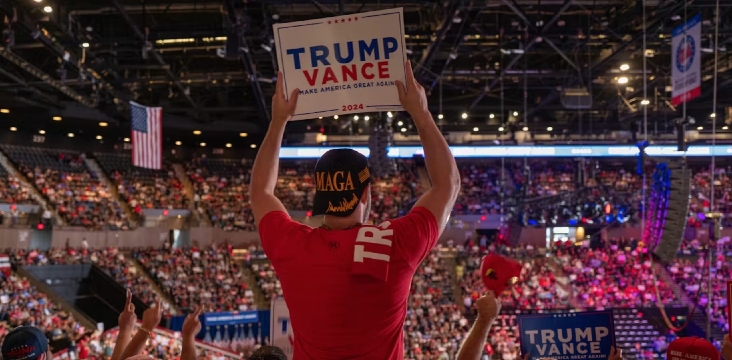 Supporters watch Donald Trump speak at a rally in Uniondale, N.Y., on Sept. 18, 2024. 