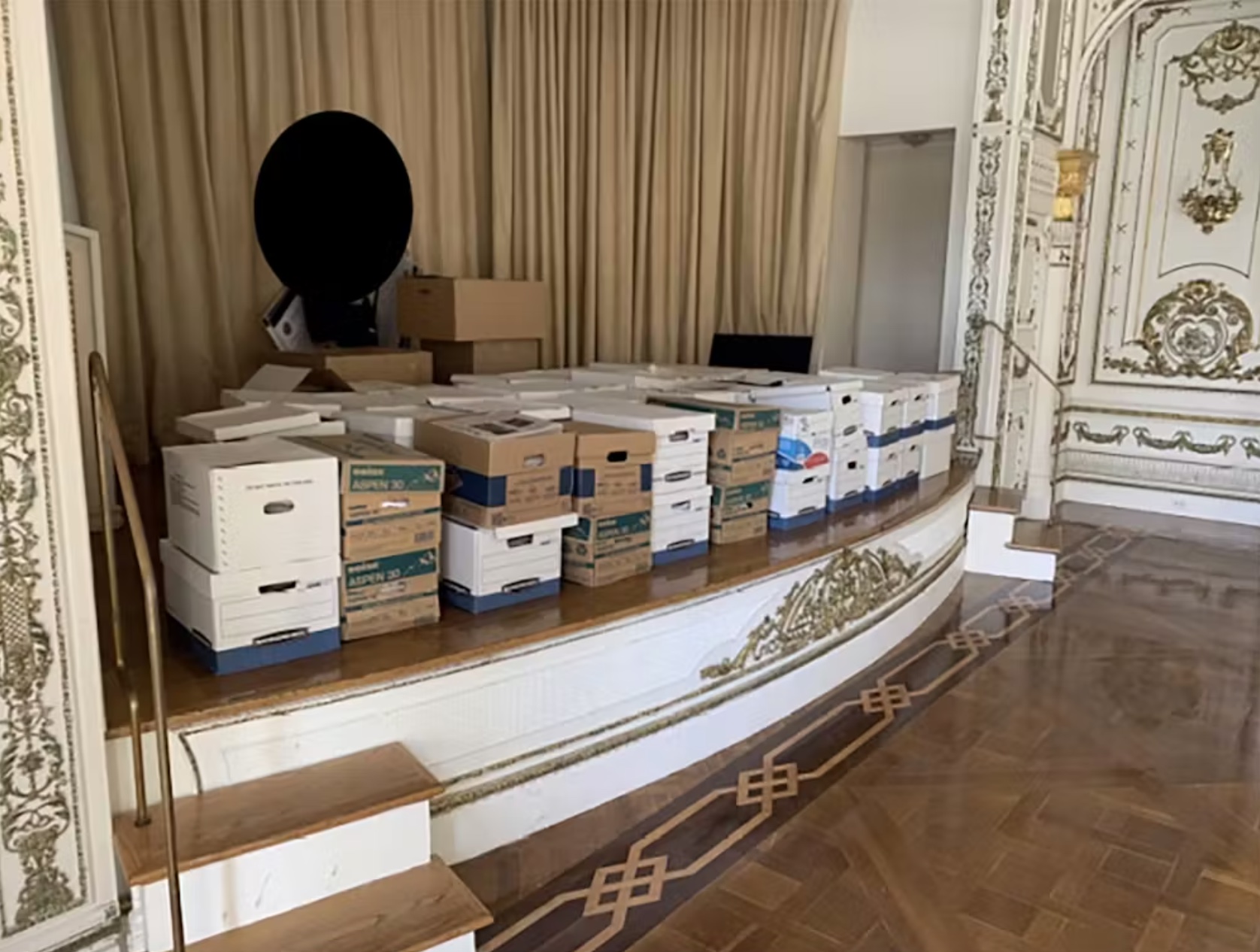 Stacks of boxes containing government documents sit in the ballroom of Donald Trump’s Mar-a-Lago estate in Palm Beach, Fla. U.S. Department of Justice via Getty Images