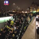 In this image taken from video, police escort Maccabi Tel Aviv supporters to the metro, after pro-Palestinian supporters marched near the soccer stadium, in Amsterdam, the Netherlands, Thursday, Nov. 7, 2024.