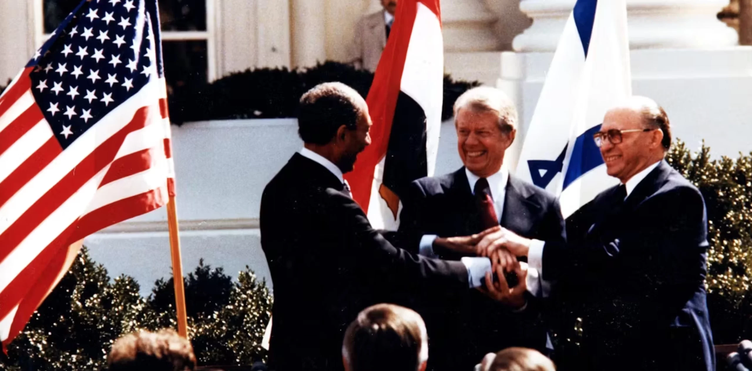 Anwar El Sadat, Jimmy Carter and Menachem Begin at the White House to sign the 1979 Egypt–Israel peace treaty. 