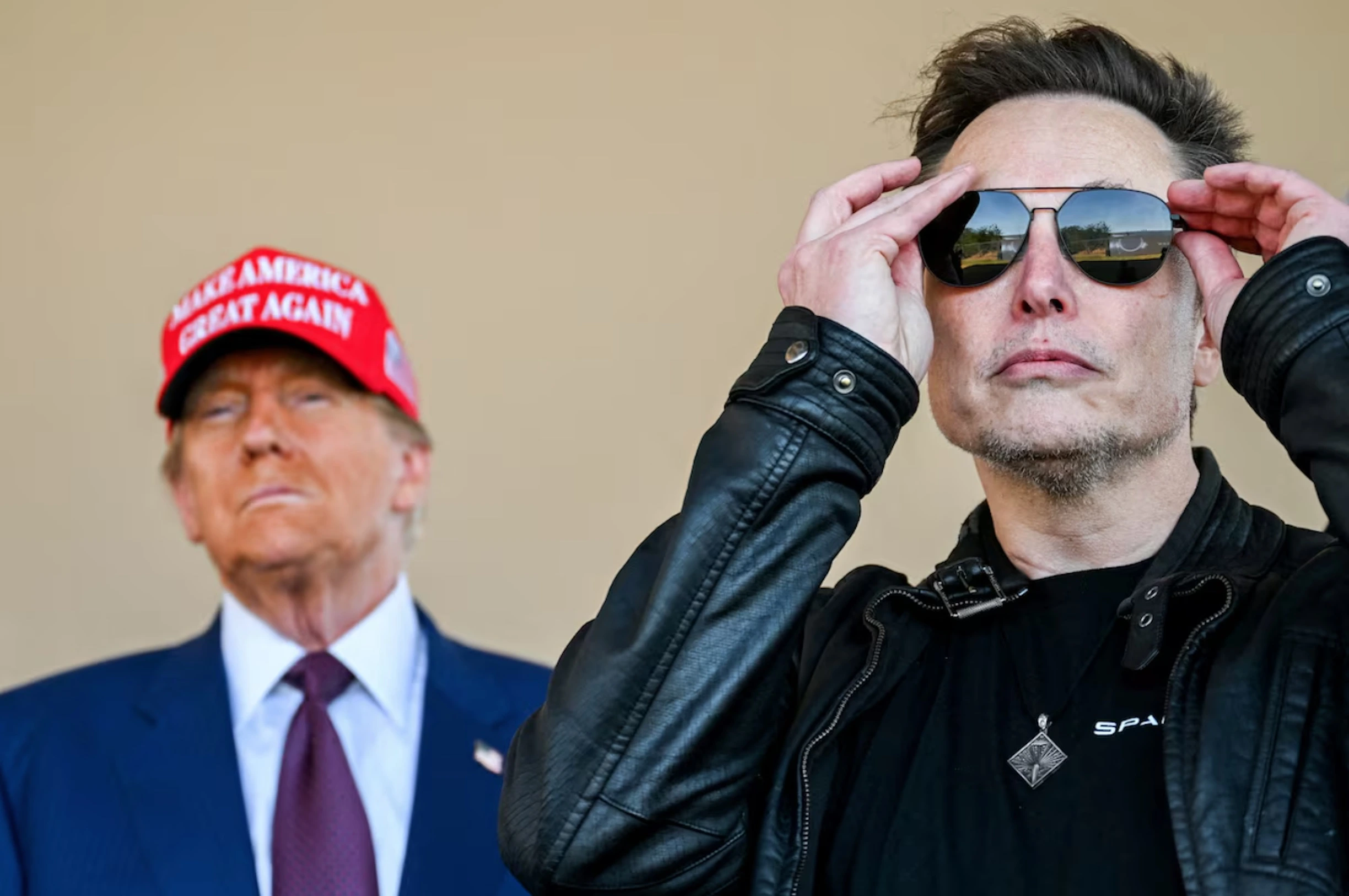 U.S. President-elect Donald Trump and Elon Musk watch the launch of the sixth test flight of the SpaceX Starship rocket in Brownsville, Texas, U.S., November 19, 2024. 