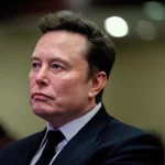 Tesla CEO and X owner Elon Musk listens as US President-elect Donald Trump speaks during a meeting with House Republicans at the Hyatt Regency hotel in Washington, DC, U.S. on November 13, 2024.