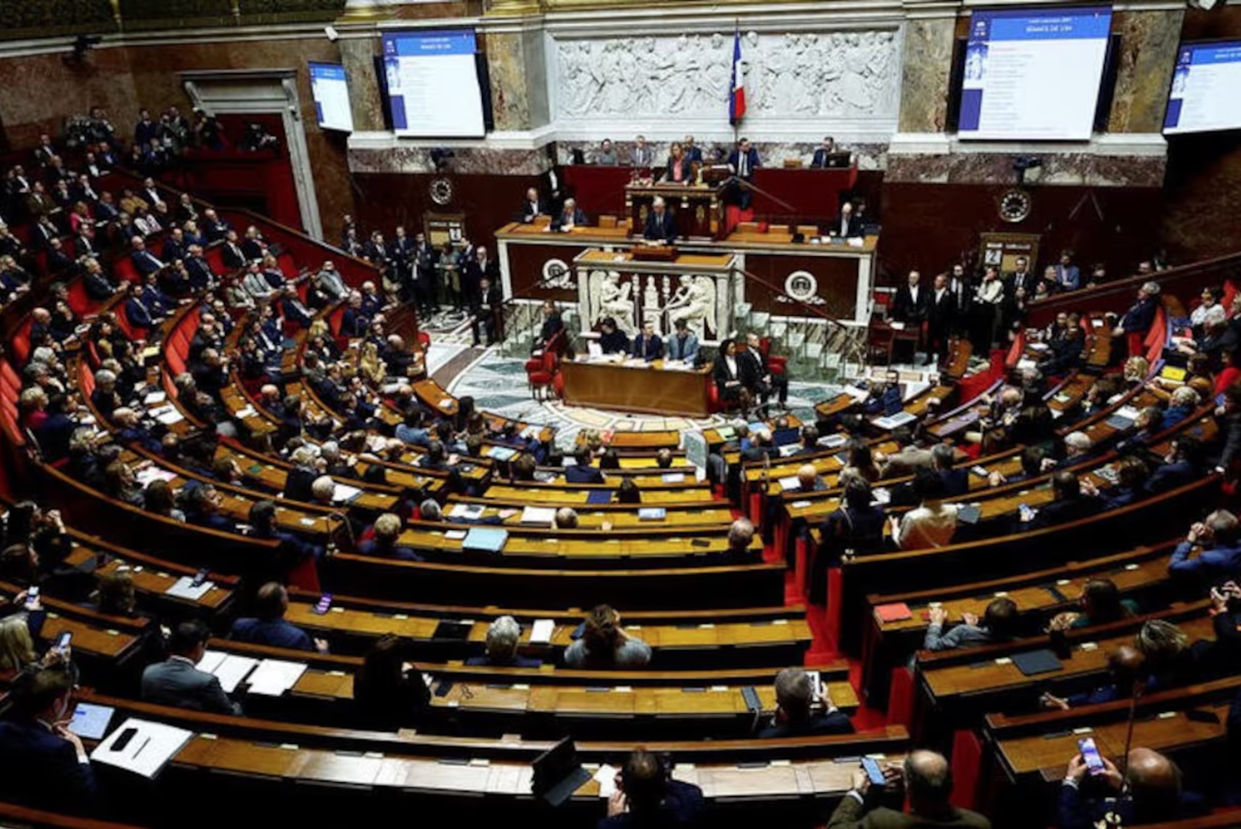 A general view shows the hemicycle as French Prime Minister Michel Barnier delivers a speech at the National Assembly in Paris, France, December 2, 2024. 