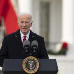 President Joe Biden speaks on the South Lawn of the White House during a ceremony to commemorate World AIDS Day with survivors, their families and advocates, Sunday, Dec. 1, 2024, in Washington.