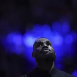 Los Angeles Lakers forward LeBron James warms up prior to an NBA basketball game against the Sacramento Kings in Sacramento, Calif., Thursday, Dec. 19, 2024.