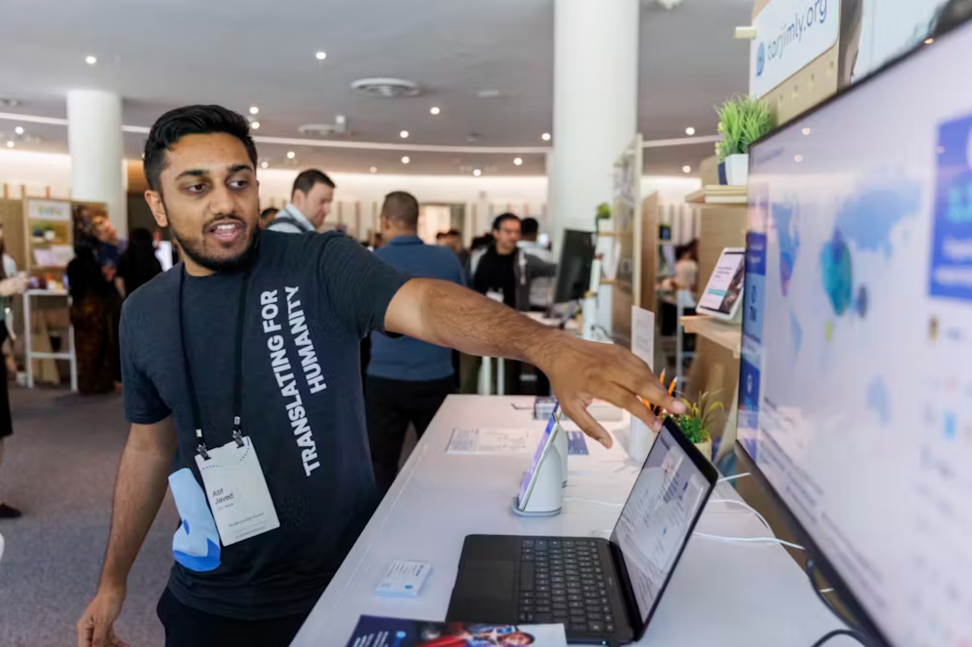 Tarjimly co-founder Atif Javed presents his app at the Google Impact Summit on Sept. 4, 2024, in Sunnyvale, Calif. 