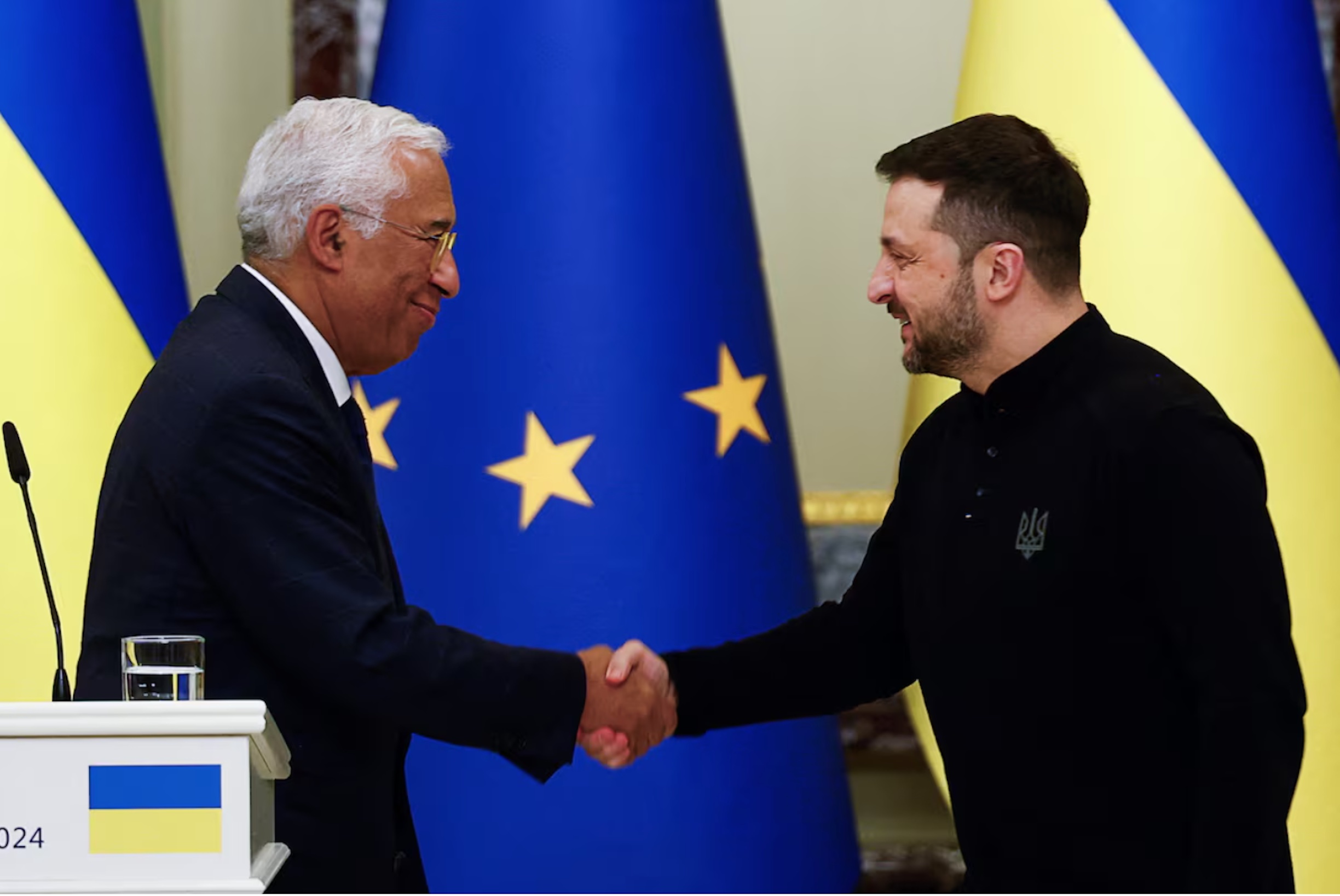 Ukraine's President Volodymyr Zelenskiy shakes hands with European Council President Antonio Costa, during a joint press conference, amid Russia's attack on Ukraine, in Kyiv, Ukraine, December 1, 2024. 