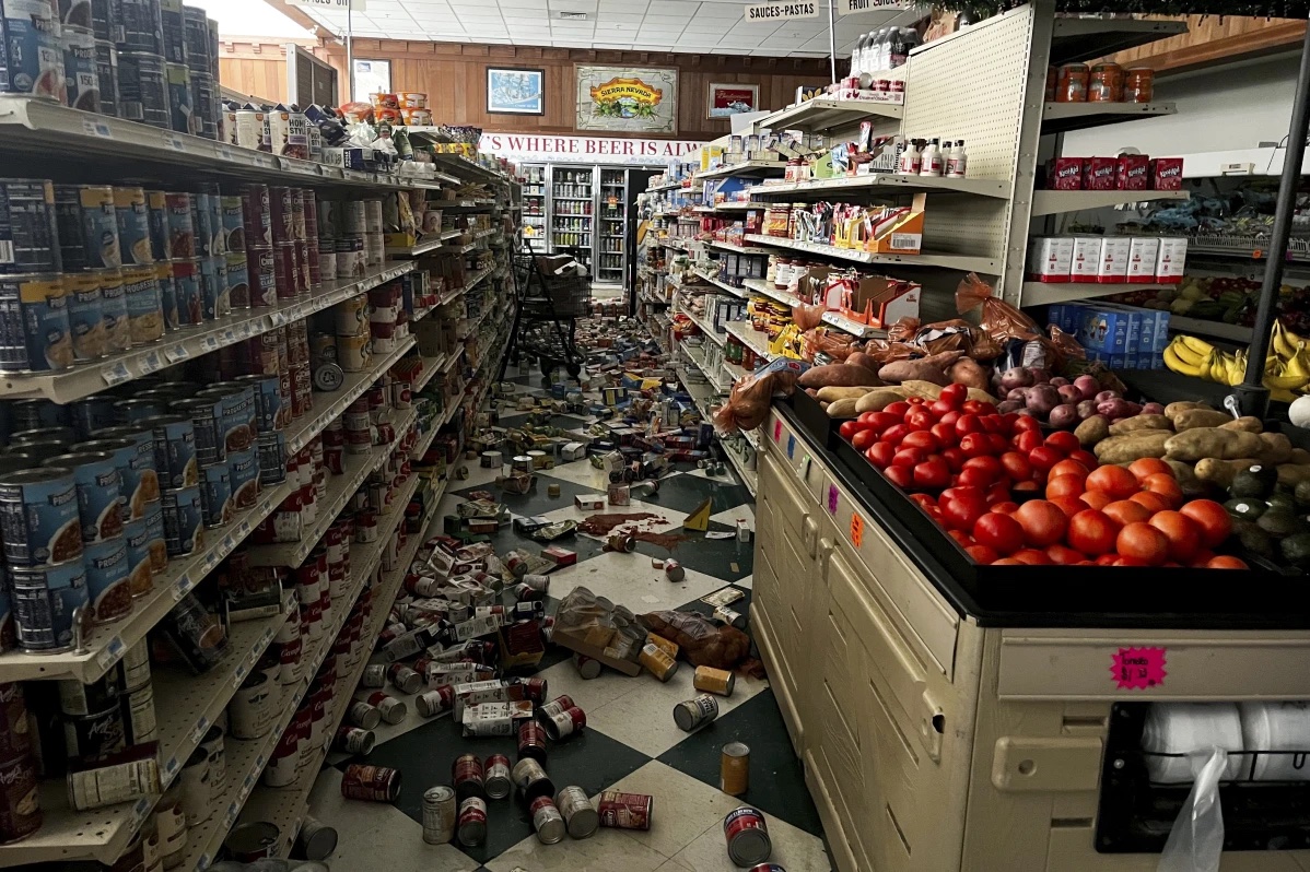 Drinks and other food items are toppled on the floor inside Hoby’s Market and Deli after a 7.0 magnitude earthquake Thursday, Dec. 5, 2024, in Scotia, Calif.