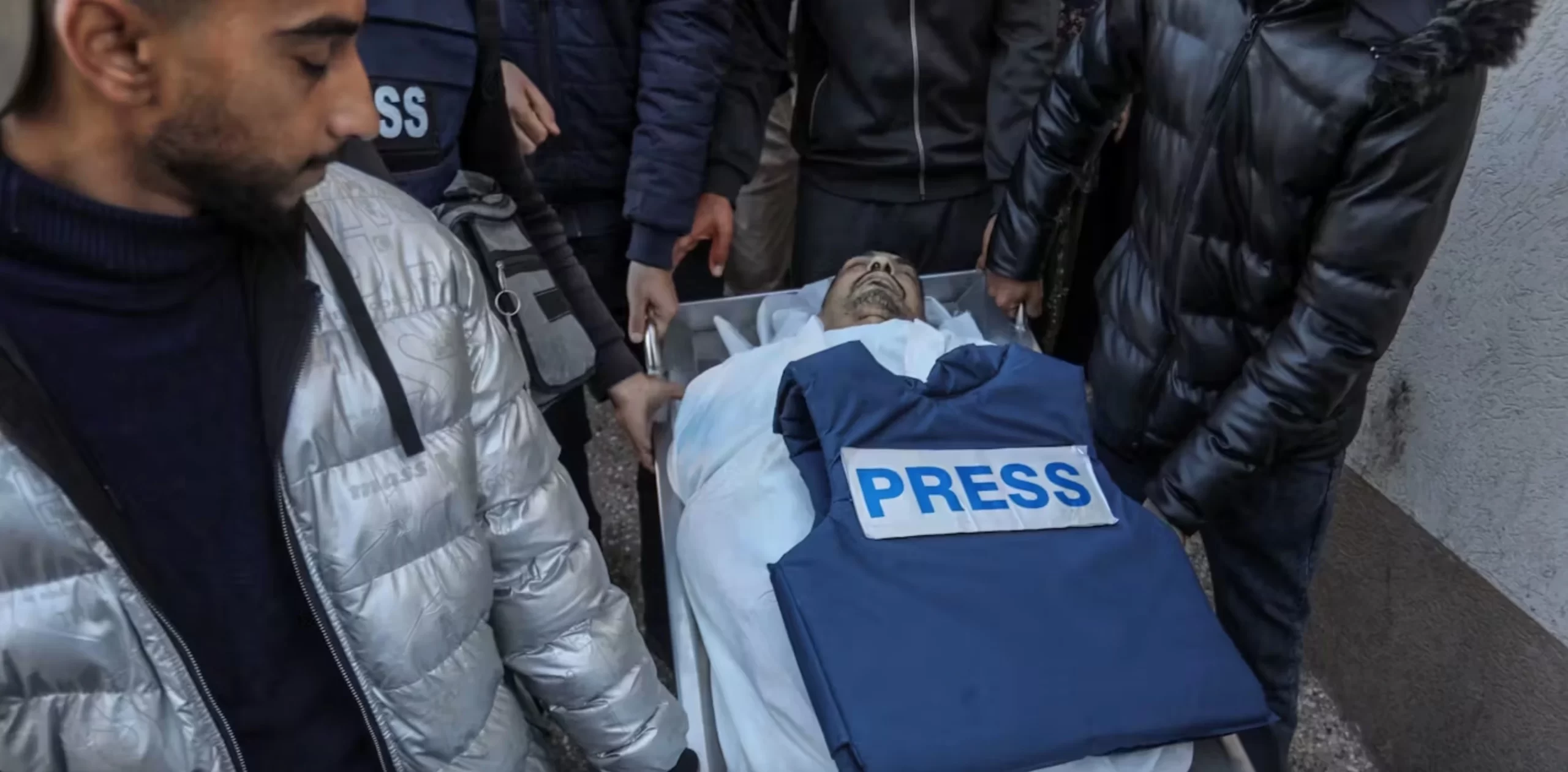 Relatives of Palestinian journalist Akram Al-Shafi'i mourn his death at the European Hospital in Gaza. Al-Shafi'i was killed during an airstrike on his home in Khan Younis, in the southern Gaza Strip, on 6 January 2024. 