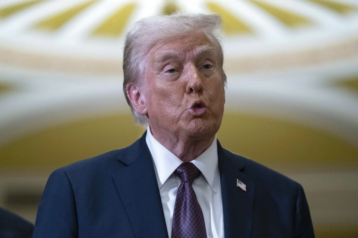 President-elect Donald Trump talks to reporters after a meeting with Republican leadership at the Capitol on Wednesday, Jan. 8, 2025, in Washington.