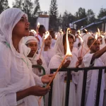 Ethiopian pilgrims pray during a Mass service for Ethiopian Christmas at the Bole Medhane Alem cathedral in Addis Ababa, Ethiopia, Monday, Jan. 6, 2025.