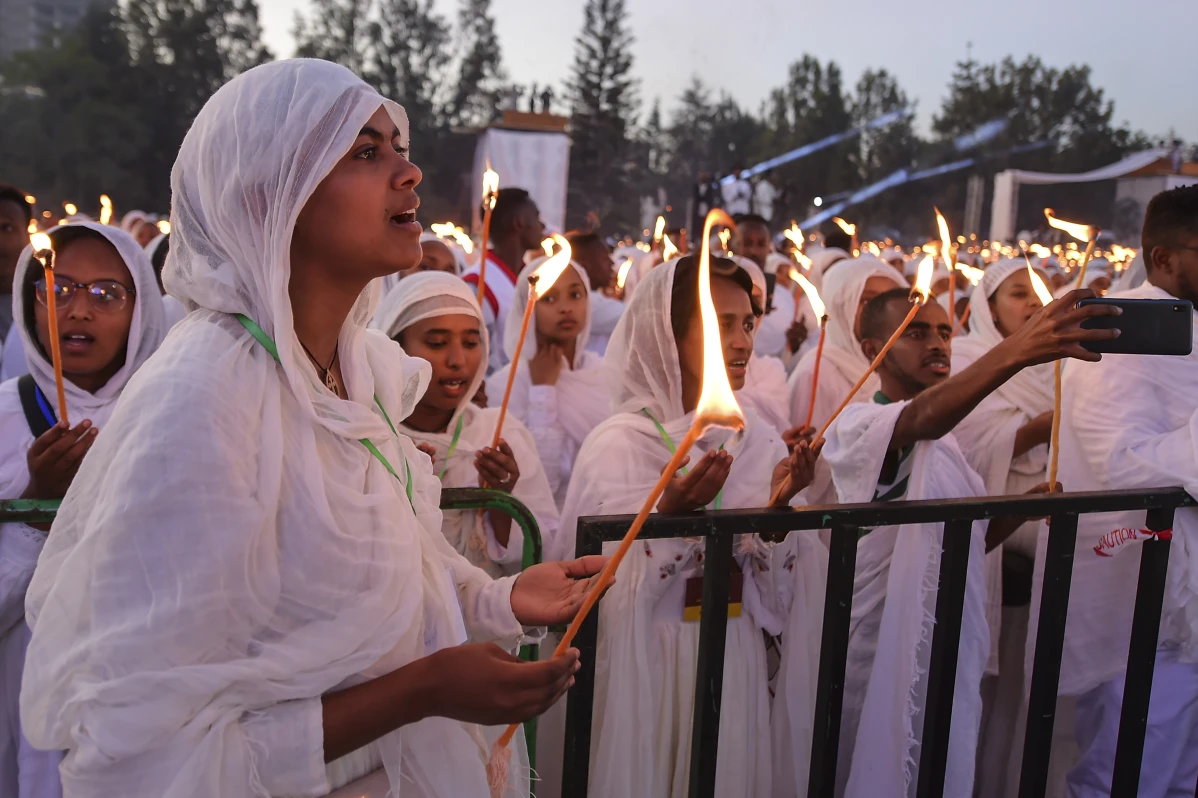 Ethiopian pilgrims pray during a Mass service for Ethiopian Christmas at the Bole Medhane Alem cathedral in Addis Ababa, Ethiopia, Monday, Jan. 6, 2025. 