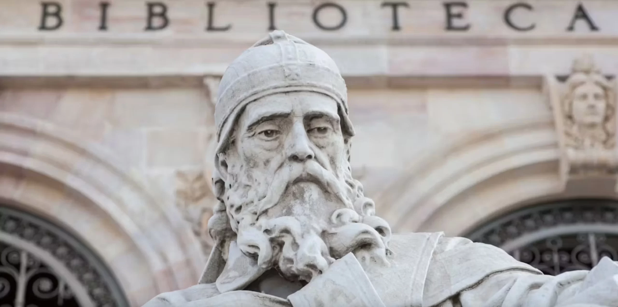 Stone statue of Saint Isidore of Seville at the National Library of Spain. 