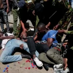 Riot police officers detain protesters demonstrating against what they say is a wave of unexplained abductions of government critics, along the Aga Khan walk in downtown Nairobi, Kenya December 30, 2024.