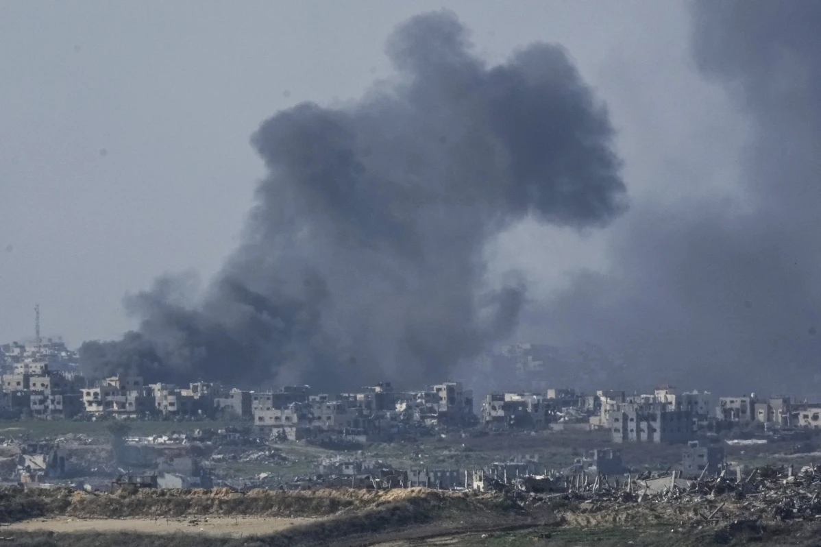 Smoke rises following an explosion in the Gaza Strip, as seen from southern Israel, Thursday, Jan. 9, 2025. 